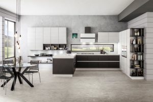 Cucina componibile disponibile nelle nuove finiture effetto cemento accostate alle nuove finiture effetto legno.